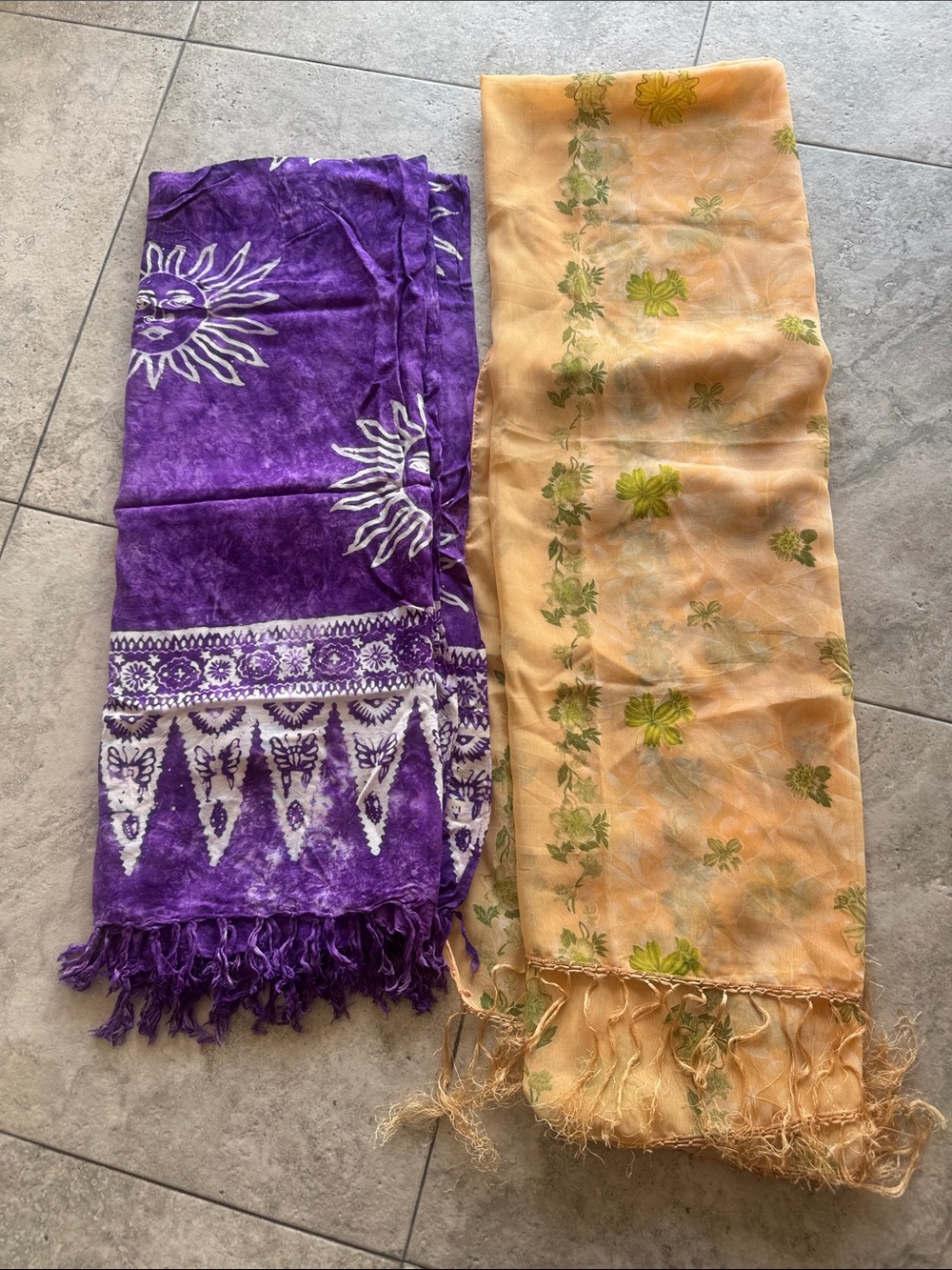 2 beach sarongs. Purple/white and coral/green with gold floral outlines